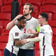 England’s striker Harry Kane (c.)celebrates with Phil Foden (r.) and Raheem Sterling after scoring the opening goal during the FIFA World Cup qualifier in March. What will Euro 2021 bring the trio?
